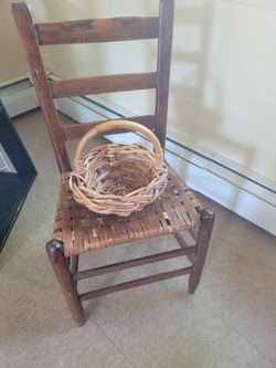 Ladder style wooden woven chair.