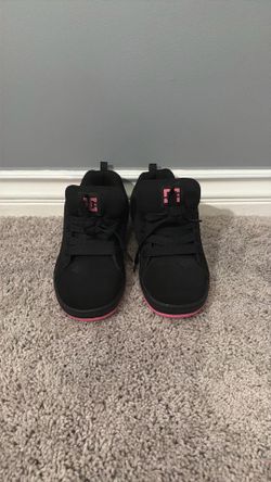 Pink and black dc shoes