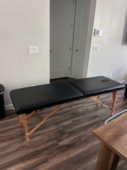 Massage table