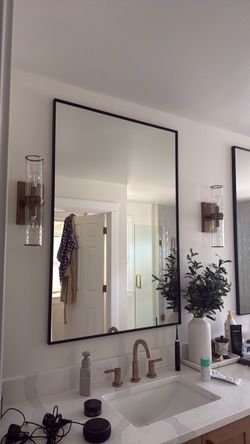 48”x 32” black framed mirror
