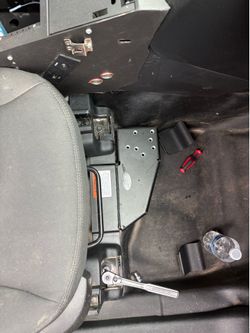 Gamber-Johnson heavy-duty vehicle mounting base, designed to provide a secure anchor point for computer mounts or other equipment.