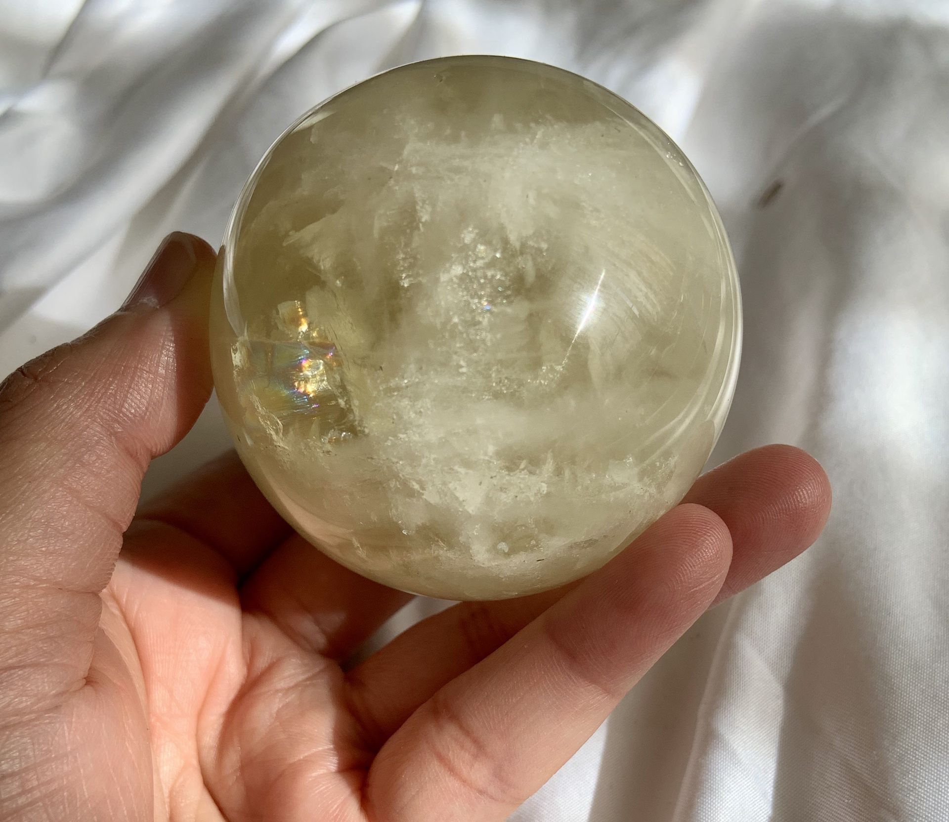 Citrine sphere with lots of rainbows