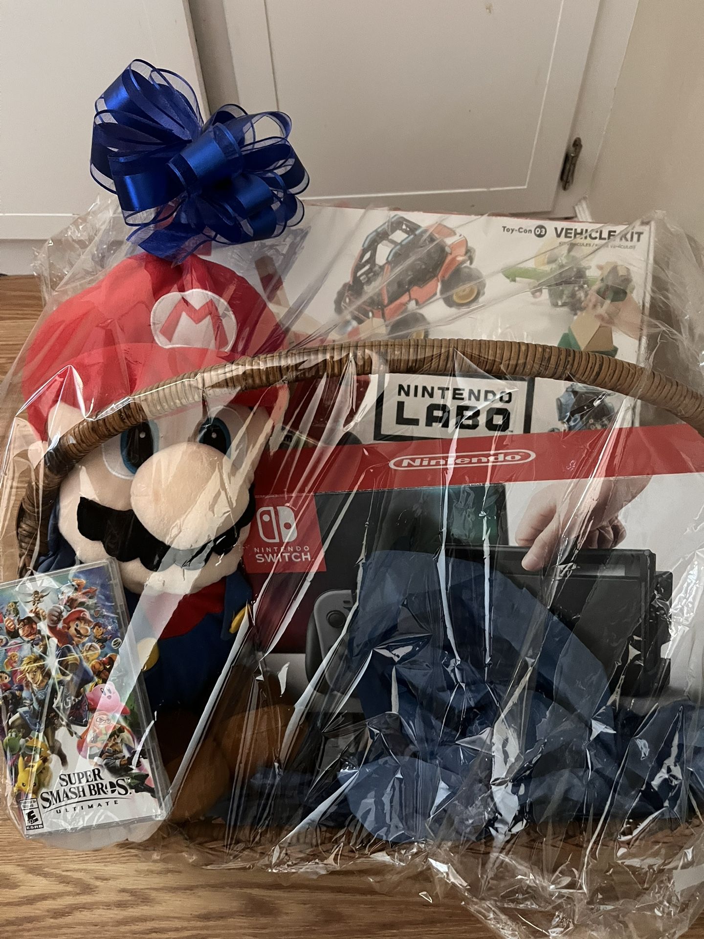 Black Nintendo Switch, Super Smash Bros Ultimate And Mario Plushie