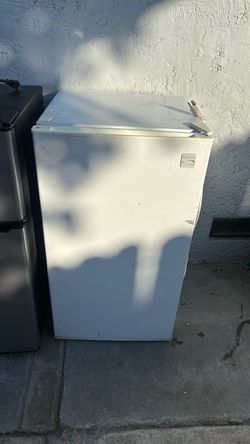 Small white fridge with freezer