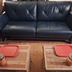 Nice blue leather couch Asking $250.00 obo
