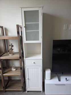 Thin and tall cabinet
