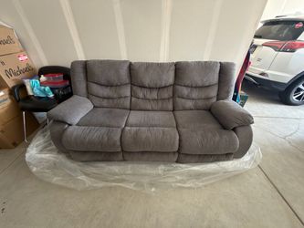 Ashley Tulen Gray Reclining Sofa (Dual Manual Recliners)
