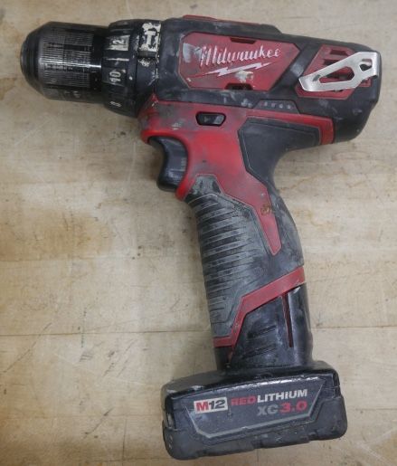 Milwaukee Drill 2408-20 & battery 48-11-2402 used 885263-1