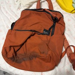 red lululemon backpack