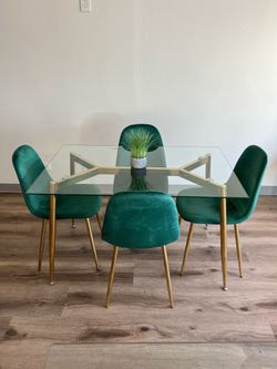 Glass Top Dining Set with Green Velvet Chairs