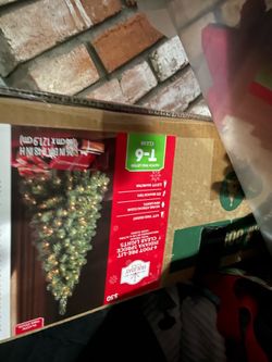 Artificial Christmas tree with prelit lites
