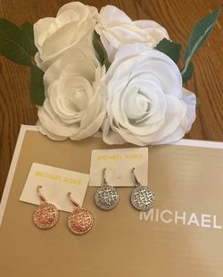 MK signature round rhinestone earrings