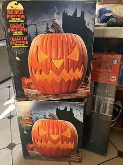 Two Halloween light up pumpkin decorations