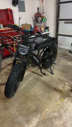 Macfox x7 374miles with surron throttle and key