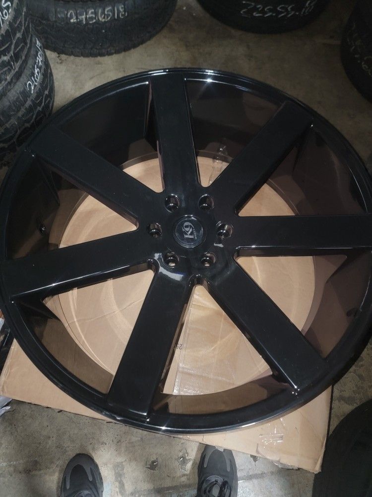 24in Black 7 Spoke Wheels. 6x 5x5 Bolt Pattern