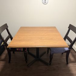 Wooden table with 2 chairs