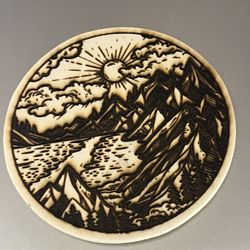 Round wooden refrigerator magnet with nature pattern.
