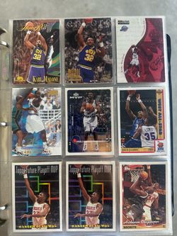 Baseball and basketball Spirts cards binder 60 pages Olajuwon,Mcgrady,Nowitzki,Chauncey, many more Clemens,Maddox,Mantle reprints, Clemente reprints,