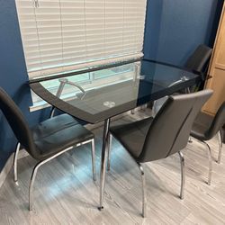 Glass Table And 4 Chairs 