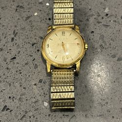 RELOJ AUTOMÁTICO,  CHAPADO  ORO 18K..