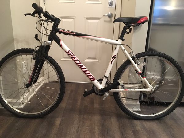 white and red specialized bike