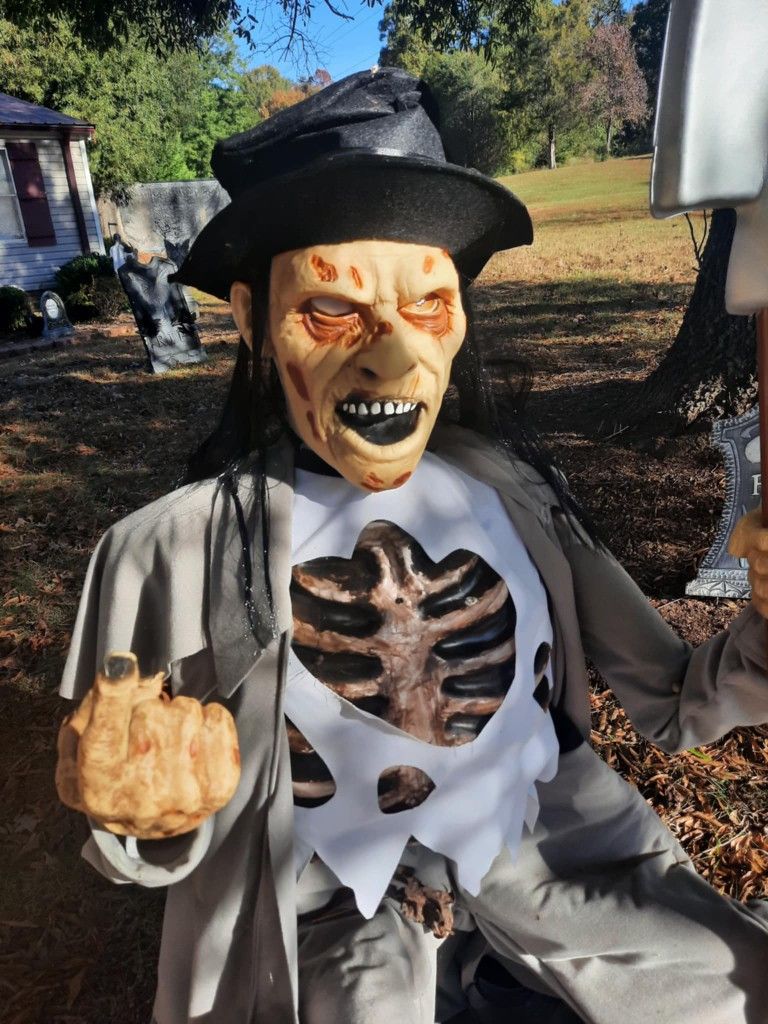 Crouching Grave Digger Animated Halloween Prop