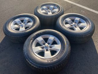 Factory 17” dodge ram 5 lug 1500 wheels & tires