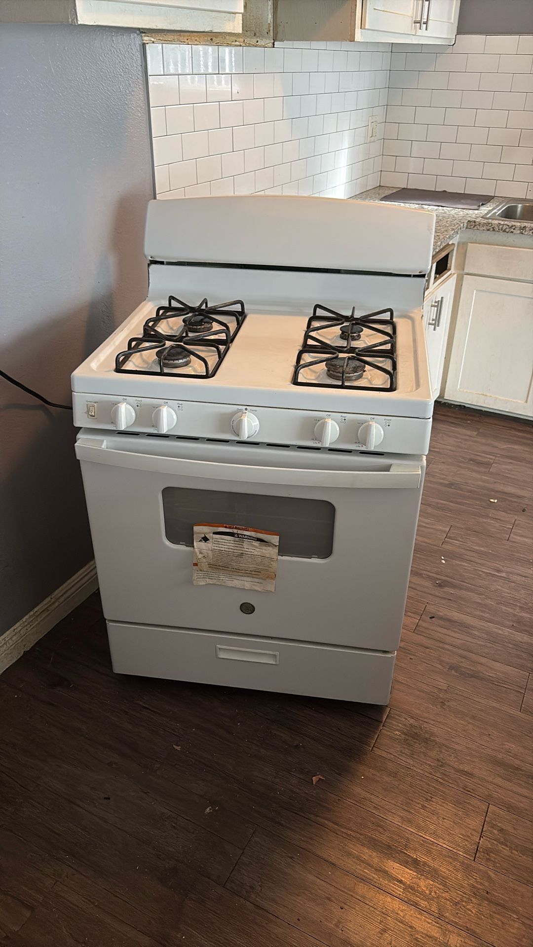 Gas Stove, Ge Perfect Working Condition Has A Small Dent On The Side