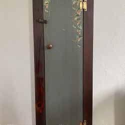 Hand-painted solid wood armoire-cabinet in an Art Nouveau style with a floral motif