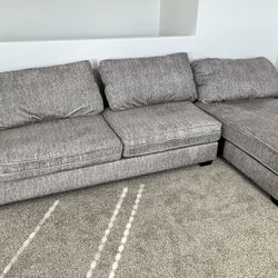 Gray Living Spaces Couch 