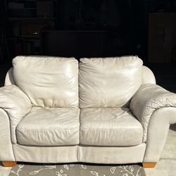 Tan leather Love seat