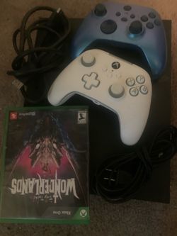 Xbox one x 1tb 2 controllers plus 2 games