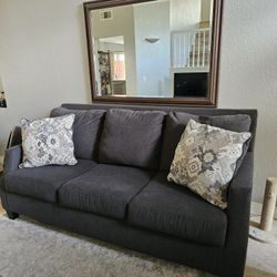 Free Charcoal Grey Couch With Decorative Pillows
