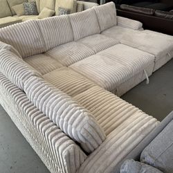 $1199 SECTIONAL WITH PULLOUT BED & STORAGE 