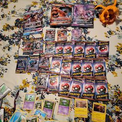 Pokemon Cards And Charzard Statue 