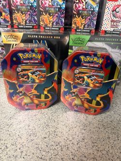 Pokemon Charizard Tins