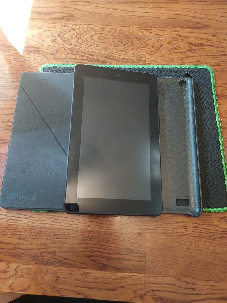 Amazon Fire 7 Tablet (2022 release). tablet in a protective case