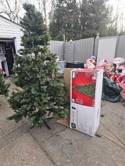 Price Is Firm.. Beautiful Seven And A Half Foot Pre-lit Christmas Tree