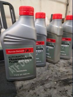 Four quarts of Honda Transmission Fluid DW-1