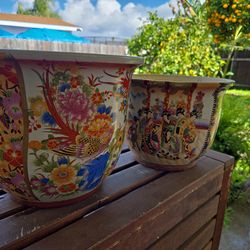 Pair of decorative Asian plant pots