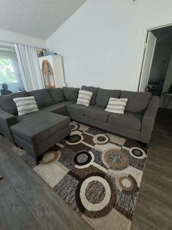 L shape sofa with pillow