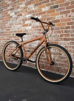 PREOWNED SE BIG RIPPER 29 WOOD GRAIN SINGLE SPEED FREESTYLE WHEELIE RIPPER BMX BIKE