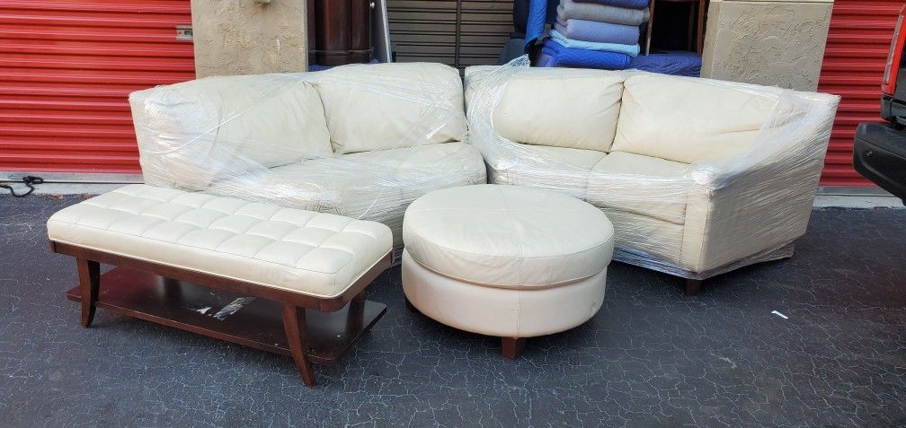 Leather Sofa And 2 Ottomans