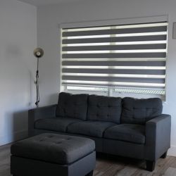 Gray sofa with matching ottoman