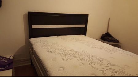 Queen sized bed + new mattress never used for sale