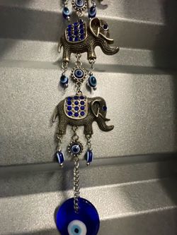 Decorative blue eye charms