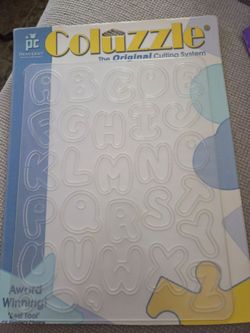 Coluzzle scrapbook cutting system