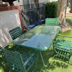 Table And 4 Chairs 