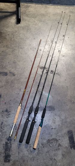4 fishing rods including one vintage fly rod