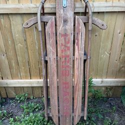 Two Antique Toboggans
